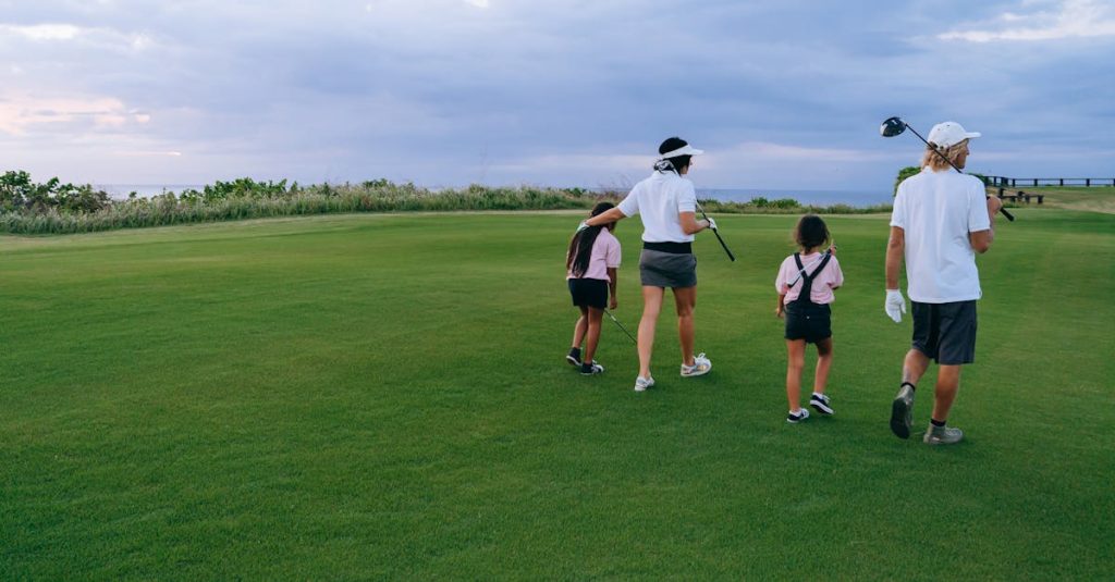 A family walks across a golf course carrying clubs, enjoying a sunny summer day.