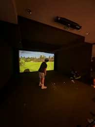 A golf simulator screen for a page on AI powered golf training